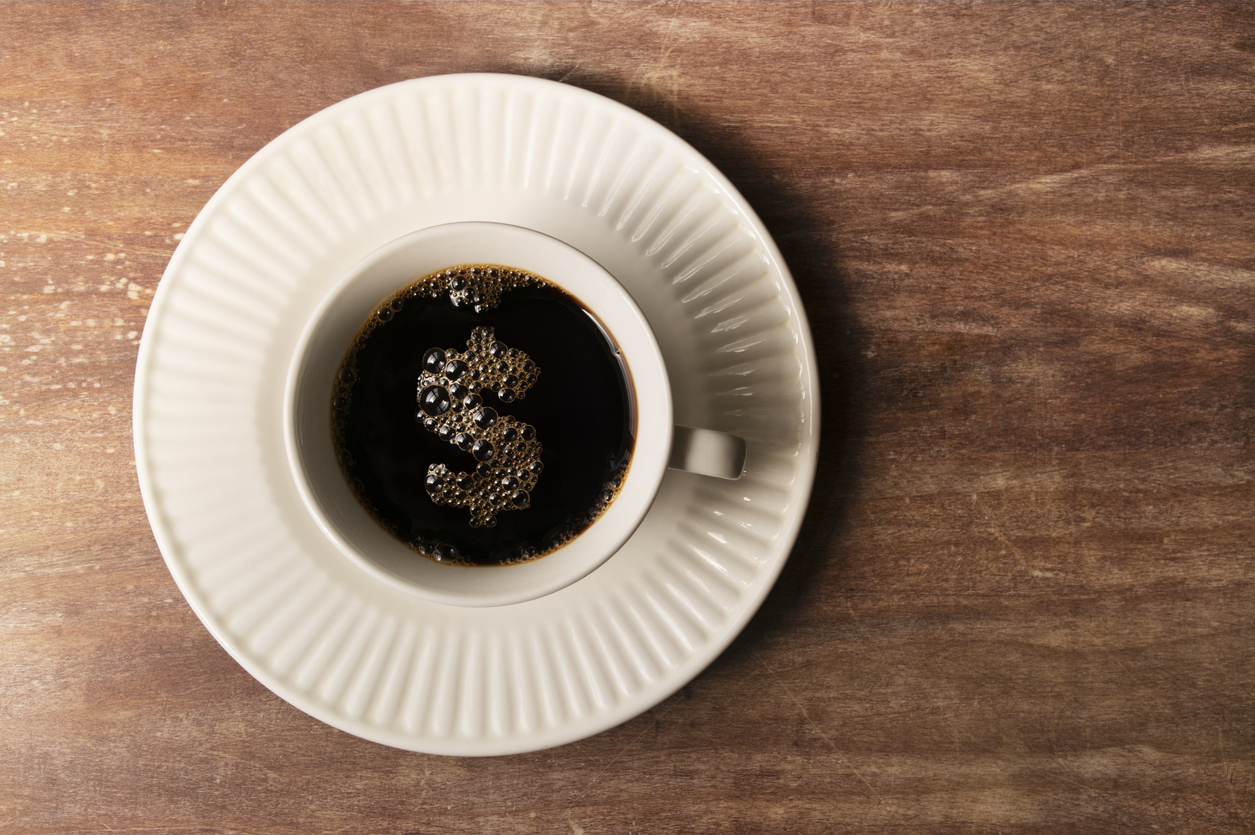 Dollar sign in coffee mug. Small commercial ice maker for opening a cafe on a budget.